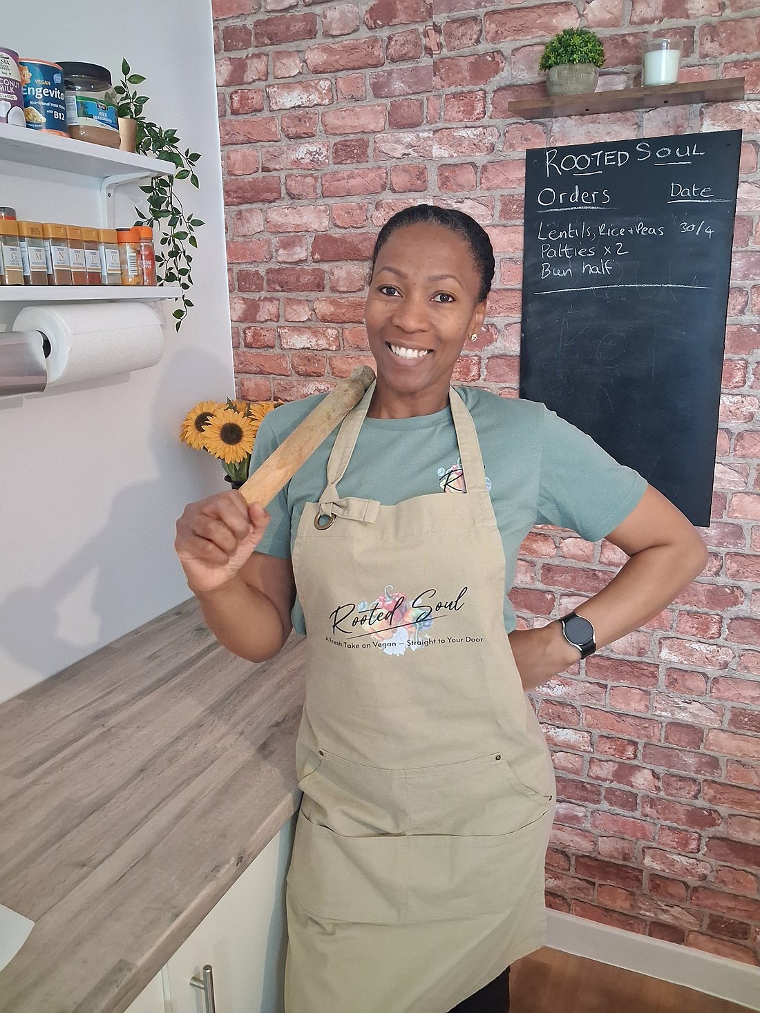 Careena, founder of Rooted Soul, in her kitchen in Newport